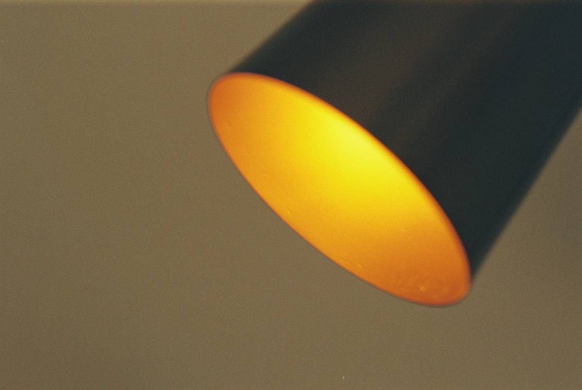 home improvement stu: adjustable LED picture light mounted above framed artwork on a gallery wall